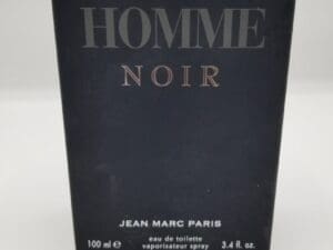 A bottle of jean marc paris homme noir perfume.