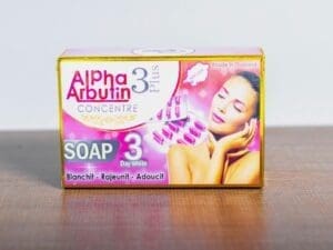 A box of ALPHA ARBUTIN CONCENTRE SOAP 3 plus 3 Day White 200g on a table.