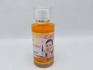 A bottle of GLUTA PAPAYA INJECTION 100% ECLAIRCISSANT 125ml skin care product.