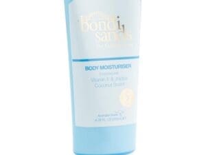 A tube of BONDI SANDS 6.76oz body moisturizer with coconut scent, featuring vitamin e and jojoba, isolated on a white background.
