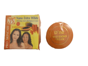 A box of cream and a disc with the name 'd no ' written on it.