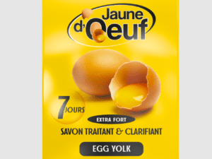 A box of eggs yolks on a table.