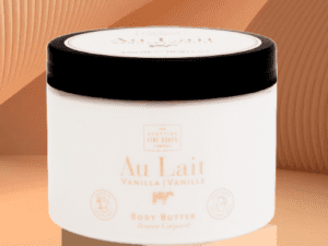 A jar of cream sitting on top of a table.