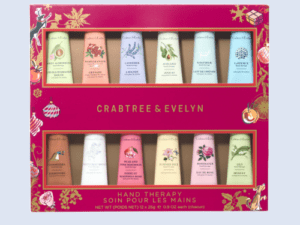 A set of two boxes with different colored hand creams.
